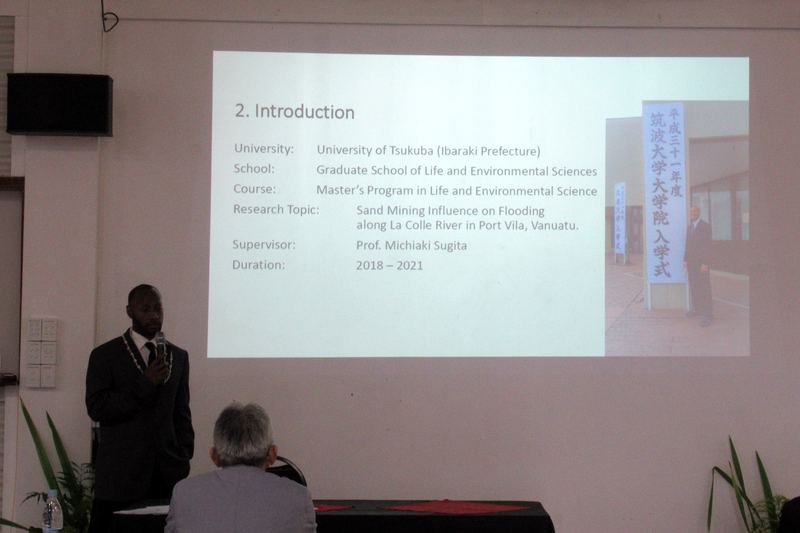Iuma Bani presenting research from the University of Tsukuba on sand mining and flooding along the La Colle River, Port Vila
